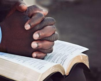 Hands of Prayer Christian Stock Image